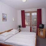 Sypialnia w Hotelu Hajnal Mezokovesd - termal welness